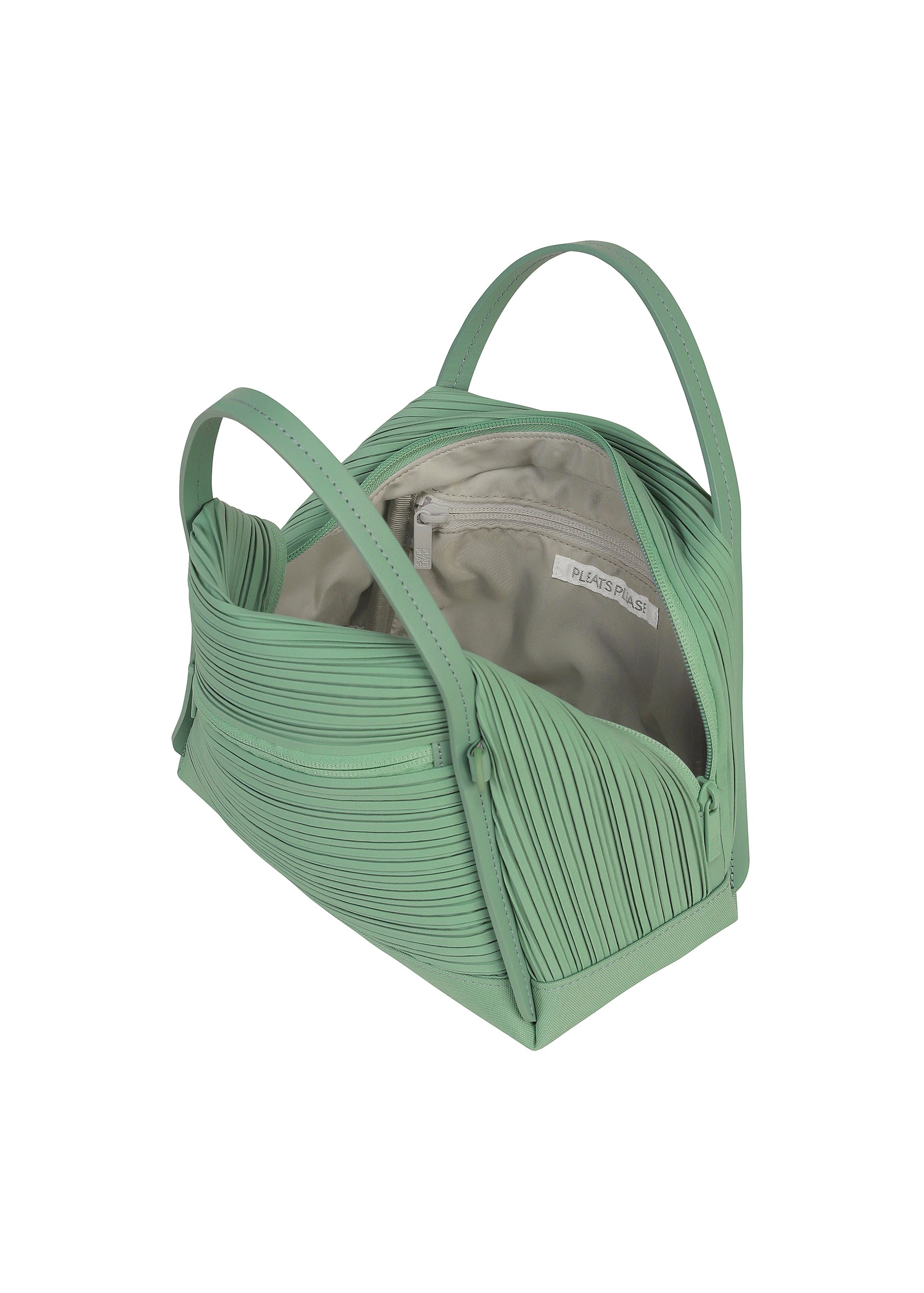 Zoomed view A light green BIAS PLEATS BAG from PLEATS PLEASE ISSEY MIYAKE, featuring a textured finish with subtle diagonal pleating and two handles. Shown unzipped, the bag reveals a beige interior lining with a zippered inner pocket, displayed against a white background.