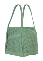 The BIAS PLEATS BAG by PLEATS PLEASE ISSEY MIYAKE is a light green bag featuring textured pleated detailing, two handles, and a small zippered side pocket. This compact accessory boasts a modern, structured design.