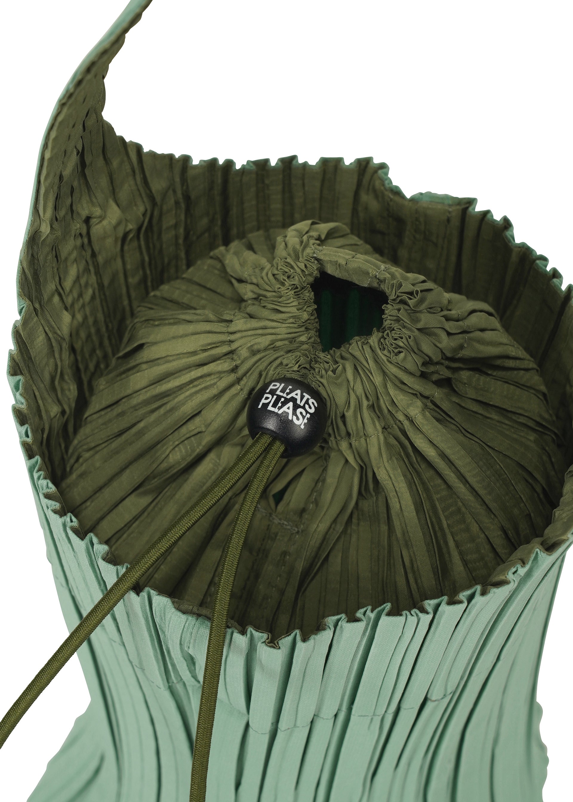 Zoomed view A close-up of the PLEATS SWAN BAG by PLEATS PLEASE ISSEY MIYAKE shows its elegant green exterior adorned with graceful vertical pleats and a partially open top. The drawstring closure features a black cord lock labeled “PLEATS PLEASE.”.