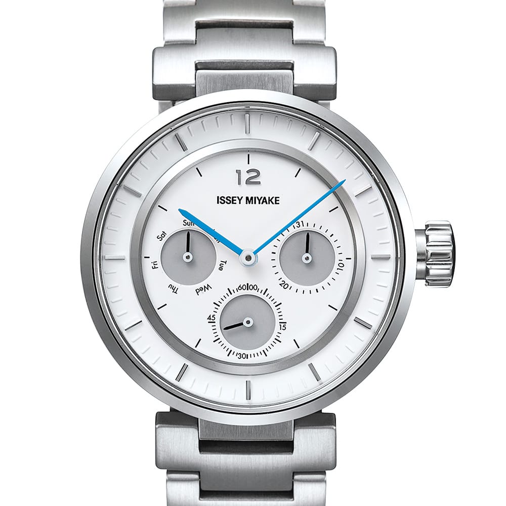 The ISSEY MIYAKE WATCH W mini by Satoshi Wada is a silver wristwatch with a white, gauge-inspired dial, three subdials, blue second hand, silver hour and minute hands, stainless steel band, and minimalist design by Japanese automotive designers. view 2 of 3