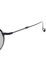 Side view of thin, dark-rimmed PANT Ⅲ titanium sunglasses, featuring a folding hinge on the temple arm.